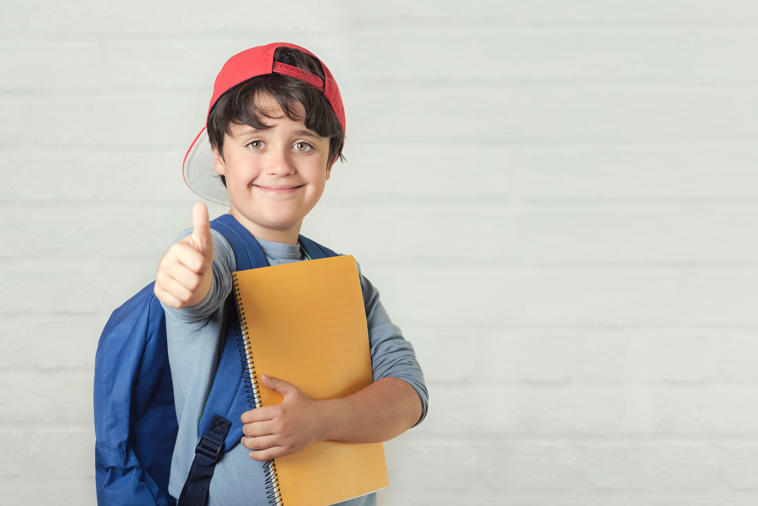 Happy Child with Backpack and with Notebook,Back to School